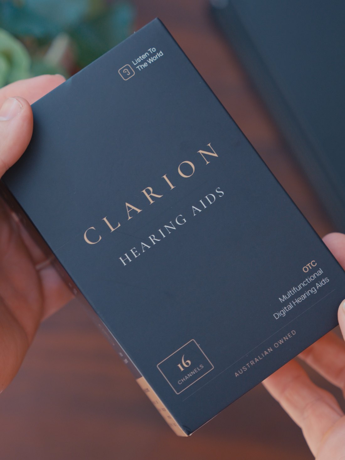 The Clarion Clarity S3 box held in hand.